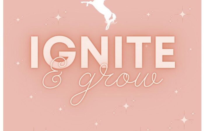 pink background with the words ignite and grow. White unicorn with pink stars scattered